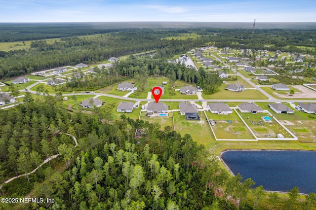 36501 Shortleaf Ave, Hilliard, FL 32046 - aerial overview of property's location featuring a heavily wooded area and a large body of water
