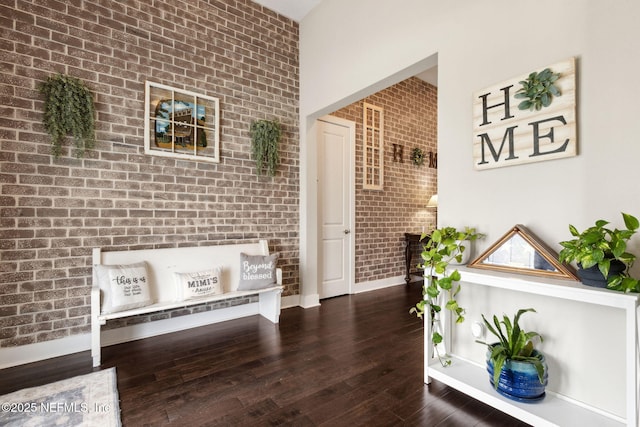 36501 Shortleaf Ave, Hilliard, FL 32046 - living area featuring hardwood / wood-style floors and brick wall