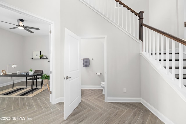 238 Courtney Chase Dr, Saint Augustine, FL 32092 - stairs with ceiling fan and baseboards