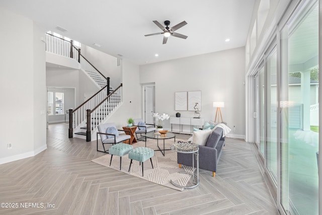238 Courtney Chase Dr, Saint Augustine, FL 32092 - living area featuring ceiling fan, stairway, recessed lighting, and a towering ceiling