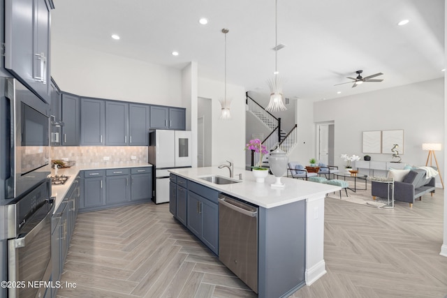 238 Courtney Chase Dr, Saint Augustine, FL 32092 - kitchen featuring stainless steel appliances, recessed lighting, light countertops, a ceiling fan, and open floor plan