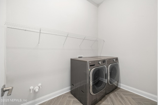 238 Courtney Chase Dr, Saint Augustine, FL 32092 - washroom with baseboards and independent washer and dryer