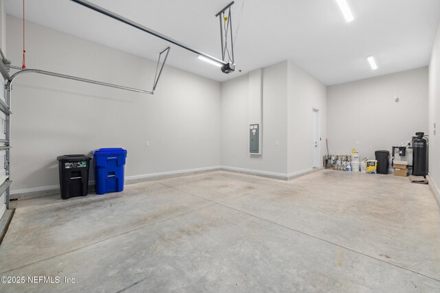 238 Courtney Chase Dr, Saint Augustine, FL 32092 - garage with baseboards and electric panel