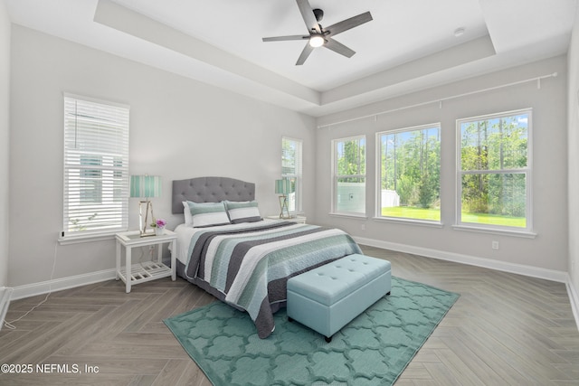 238 Courtney Chase Dr, Saint Augustine, FL 32092 - bedroom with a tray ceiling and ceiling fan
