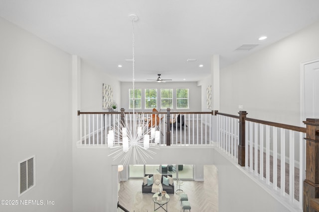 238 Courtney Chase Dr, Saint Augustine, FL 32092 - hallway with recessed lighting, a chandelier, and an upstairs landing