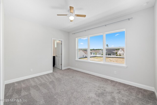 238 Courtney Chase Dr, Saint Augustine, FL 32092 - spare room with carpet floors, ceiling fan, and a smoke detector