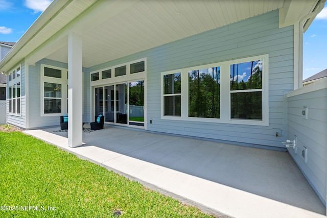 238 Courtney Chase Dr, Saint Augustine, FL 32092 - rear view of property with a patio area and a yard