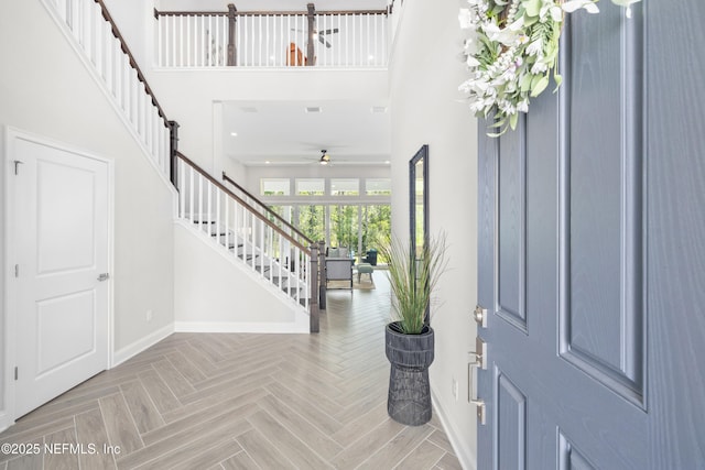 238 Courtney Chase Dr, Saint Augustine, FL 32092 - foyer entrance featuring stairs, a high ceiling, and ceiling fan