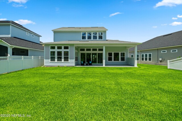 238 Courtney Chase Dr, Saint Augustine, FL 32092 - back of property with a patio and roof with shingles