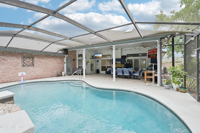 1288 Creek Bend Rd, Saint Johns, FL 32259 - outdoor pool featuring a ceiling fan, a patio area, and glass enclosure