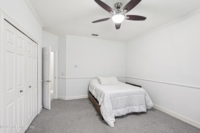 1288 Creek Bend Rd, Saint Johns, FL 32259 - carpeted bedroom featuring a closet, crown molding, and a ceiling fan