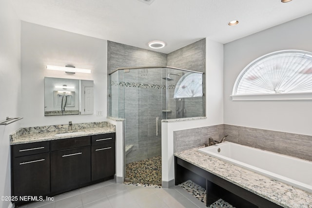 1288 Creek Bend Rd, Saint Johns, FL 32259 - full bath featuring a garden tub, vanity, a shower stall, tile patterned flooring, and recessed lighting
