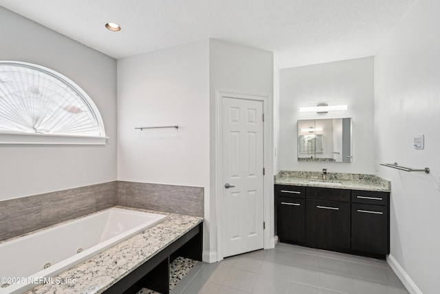 1288 Creek Bend Rd, Saint Johns, FL 32259 - full bath featuring vanity, a jetted tub, and tile patterned floors