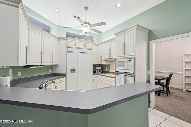 1288 Creek Bend Rd, Saint Johns, FL 32259 - kitchen with white appliances, ceiling fan, dark countertops, light colored carpet, and crown molding