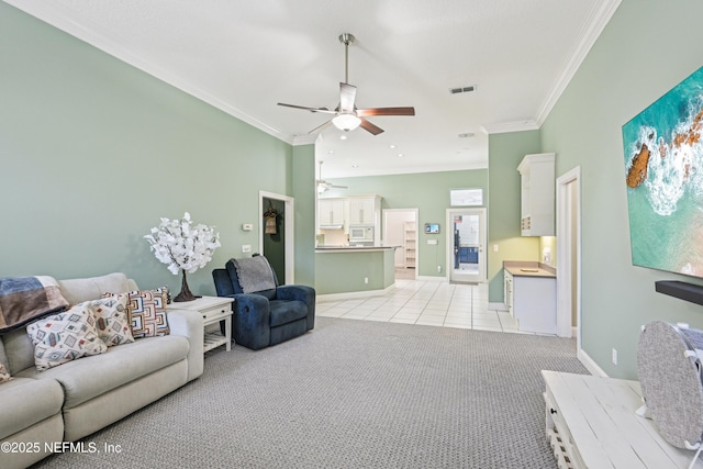 1288 Creek Bend Rd, Saint Johns, FL 32259 - living area with a ceiling fan, ornamental molding, light tile patterned floors, and light colored carpet