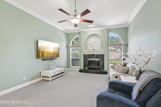 1288 Creek Bend Rd, Saint Johns, FL 32259 - living room with carpet floors, healthy amount of natural light, ornamental molding, ceiling fan, and a fireplace
