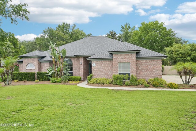 1288 Creek Bend Rd, Saint Johns, FL 32259 - view of front facade with roof with shingles and brick siding