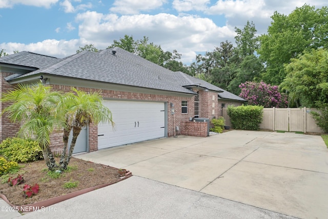 1288 Creek Bend Rd, Saint Johns, FL 32259 - view of property exterior featuring roof with shingles, brick siding, concrete driveway, and an attached garage