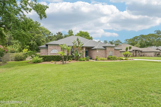 1288 Creek Bend Rd, Saint Johns, FL 32259 - view of front of property featuring brick siding and a shingled roof