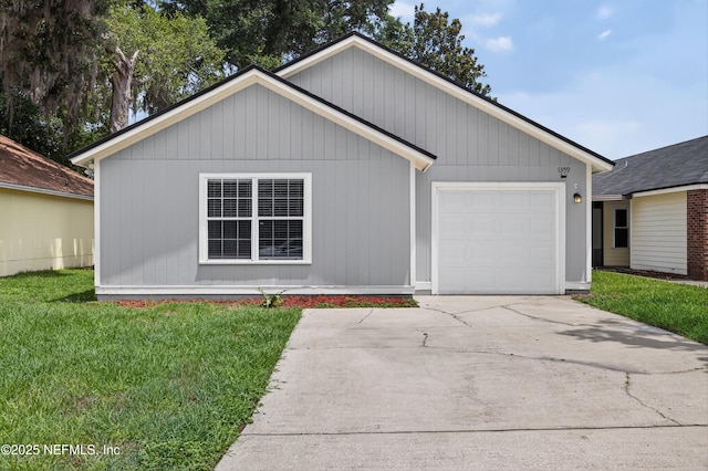 1359 Cove Landing Dr, Jacksonville, FL 32233 - ranch-style home with a garage, a front yard, and driveway