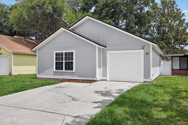 1359 Cove Landing Dr, Jacksonville, FL 32233 - ranch-style home with a garage, a front lawn, and concrete driveway