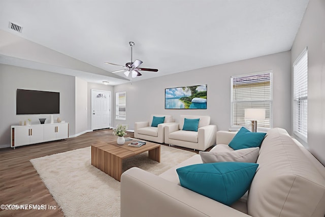 1359 Cove Landing Dr, Jacksonville, FL 32233 - living area with plenty of natural light, lofted ceiling, ceiling fan, and wood finished floors