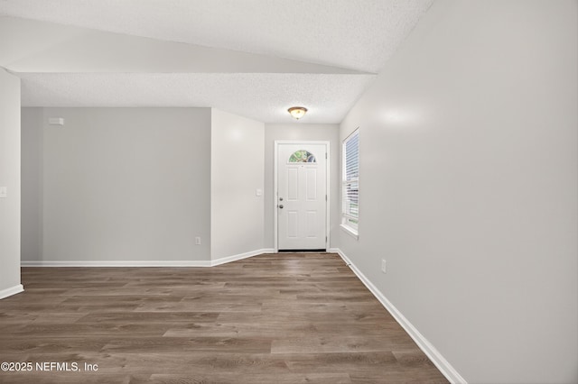 1359 Cove Landing Dr, Jacksonville, FL 32233 - entryway with a textured ceiling and wood finished floors