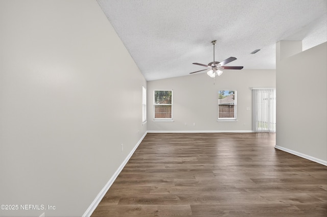 1359 Cove Landing Dr, Jacksonville, FL 32233 - unfurnished room featuring a ceiling fan, a textured ceiling, dark wood-style flooring, and vaulted ceiling
