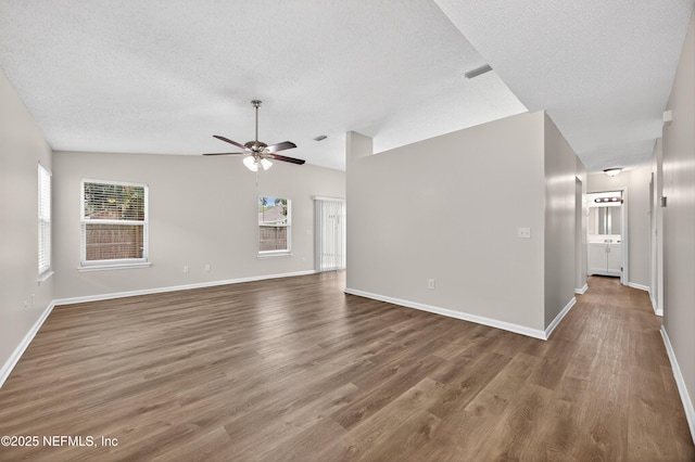 1359 Cove Landing Dr, Jacksonville, FL 32233 - unfurnished living room with a textured ceiling, a ceiling fan, and wood finished floors