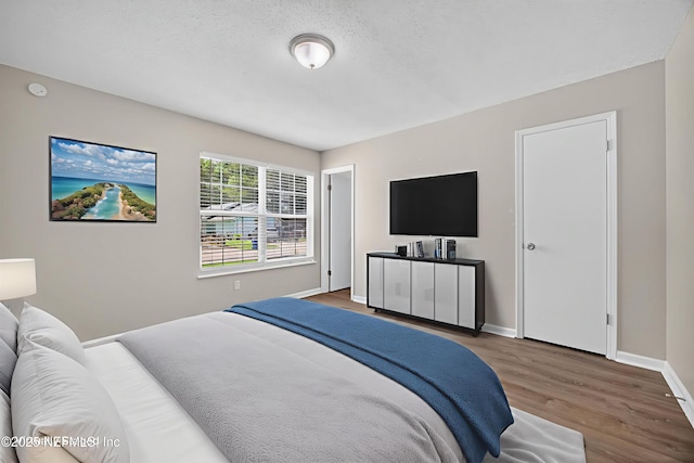 1359 Cove Landing Dr, Jacksonville, FL 32233 - bedroom featuring wood finished floors and baseboards
