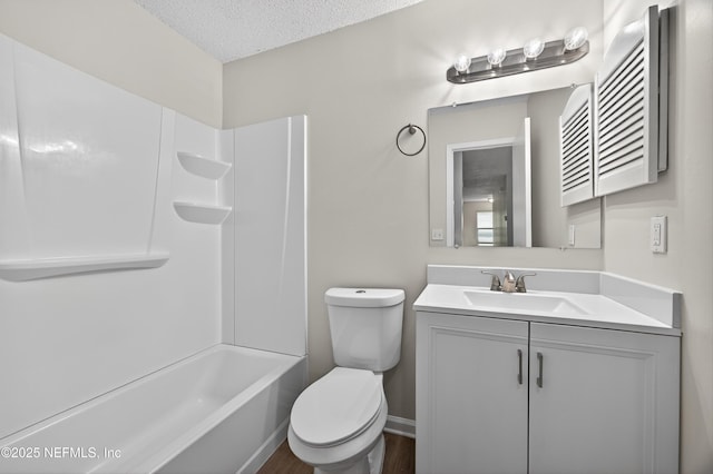 1359 Cove Landing Dr, Jacksonville, FL 32233 - bathroom featuring vanity, a textured ceiling, tub / shower combination, and wood finished floors