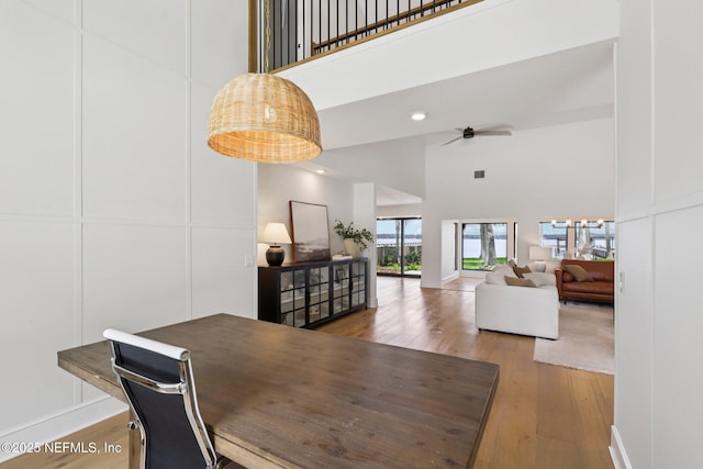 1823 N Lakeshore Dr, Fleming Island, FL 32003 - dining space featuring a high ceiling, hardwood / wood-style flooring, a ceiling fan, and recessed lighting