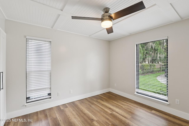 1823 N Lakeshore Dr, Fleming Island, FL 32003 - empty room with wood finished floors, a ceiling fan, and beamed ceiling