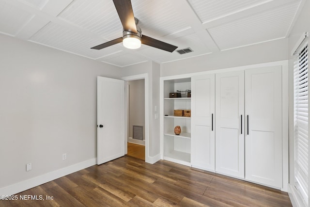 1823 N Lakeshore Dr, Fleming Island, FL 32003 - unfurnished bedroom featuring dark wood-type flooring, a closet, and a ceiling fan