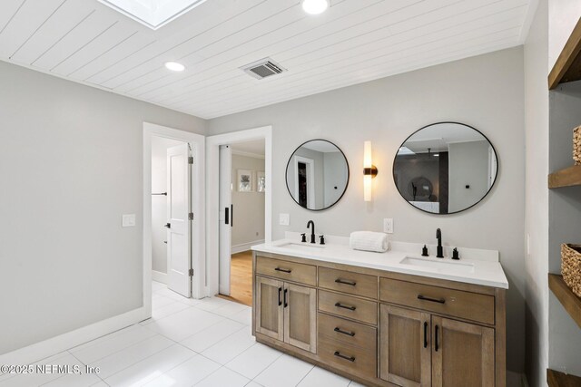 1823 N Lakeshore Dr, Fleming Island, FL 32003 - full bathroom featuring double vanity, wood ceiling, tile patterned flooring, and recessed lighting
