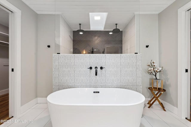 1823 N Lakeshore Dr, Fleming Island, FL 32003 - bathroom featuring a freestanding tub, tile patterned floors, and walk in shower