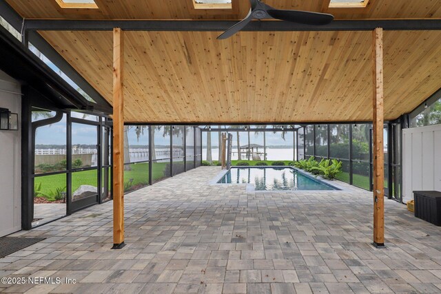 1823 N Lakeshore Dr, Fleming Island, FL 32003 - outdoor pool with a water view, ceiling fan, a patio area, and a lanai