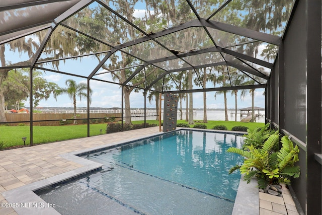 1823 N Lakeshore Dr, Fleming Island, FL 32003 - view of swimming pool with a patio, a lawn, a water view, and a lanai