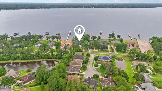 1823 N Lakeshore Dr, Fleming Island, FL 32003 - aerial view of property's location with nearby suburban area and a nearby body of water