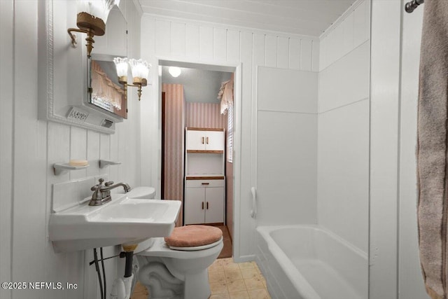 37206 Cypress Ln, Hilliard, FL 32046 - bathroom with toilet and wooden walls