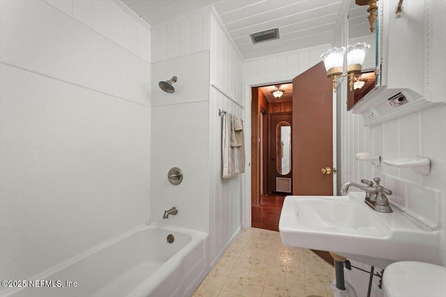 37206 Cypress Ln, Hilliard, FL 32046 - bathroom with bathtub / shower combination, tile patterned floors, and ornamental molding