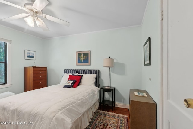112 S 14th St, Fernandina Beach, FL 32034 - bedroom featuring wood finished floors, ornamental molding, and a ceiling fan
