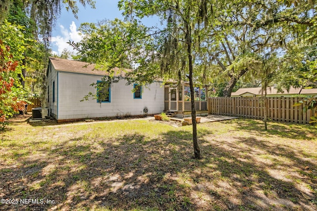 112 S 14th St, Fernandina Beach, FL 32034 - back of house featuring a sunroom