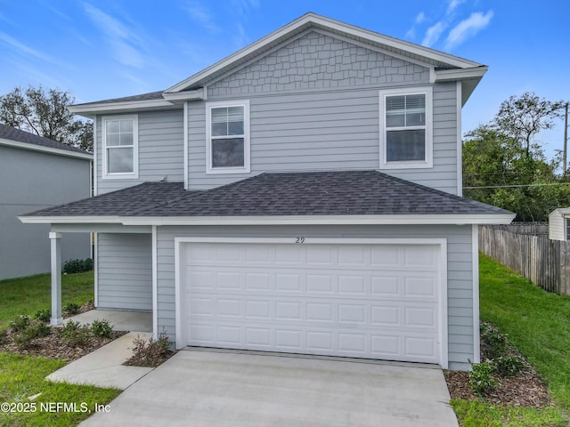 29 Wood Ash Ln, Palm Coast, FL 32164 - view of side of property with roof with shingles, driveway, and a garage
