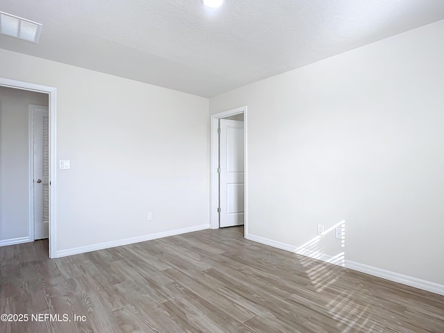 29 Wood Ash Ln, Palm Coast, FL 32164 - empty room with wood finished floors