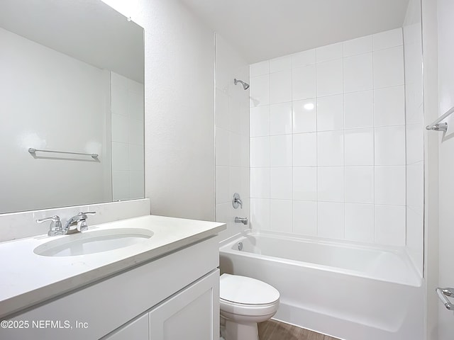 29 Wood Ash Ln, Palm Coast, FL 32164 - bathroom with vanity, shower / bath combination, and wood finished floors
