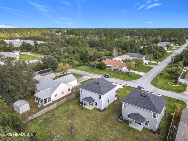29 Wood Ash Ln, Palm Coast, FL 32164 - aerial perspective of suburban area featuring a heavily wooded area