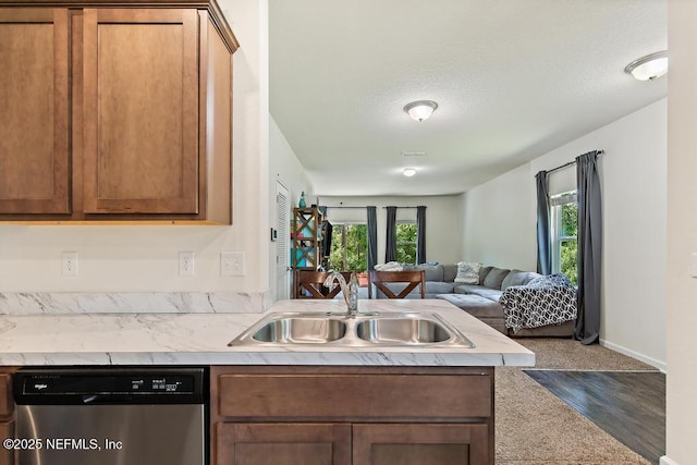 81 Scotch Pebble Dr, Saint Augustine, FL 32259 - kitchen with dishwasher, open floor plan, light countertops, and a peninsula
