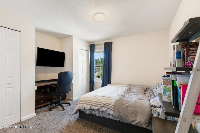 81 Scotch Pebble Dr, Saint Augustine, FL 32259 - carpeted bedroom with a textured ceiling and a desk