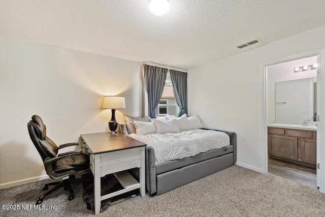 81 Scotch Pebble Dr, Saint Augustine, FL 32259 - carpeted bedroom with a textured ceiling, cooling unit, and connected bathroom